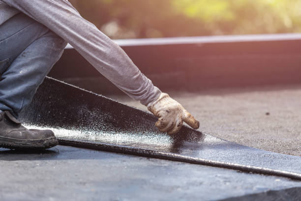Professional Emergency Waterproofing technician working in Nashua, NH